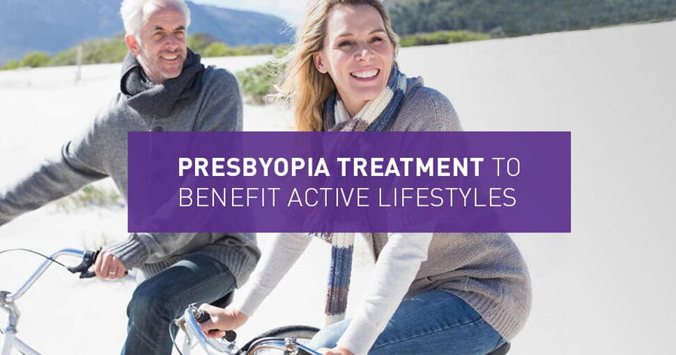 Middle aged couple riding bikes - presbyopia treatment to benefit active lifestyles