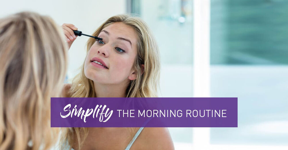 Women putting on Mascara in the Mirror - Simplify The Morning Routine Graphic.