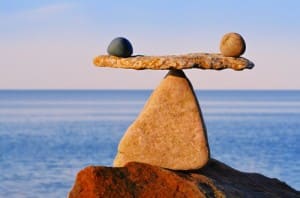 balancing rock overlooking ocean