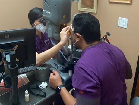 Dr. Echegoyen getting an eye exam