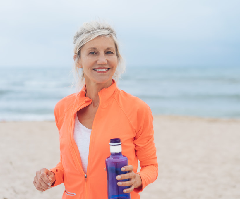 middle aged woman at the beach