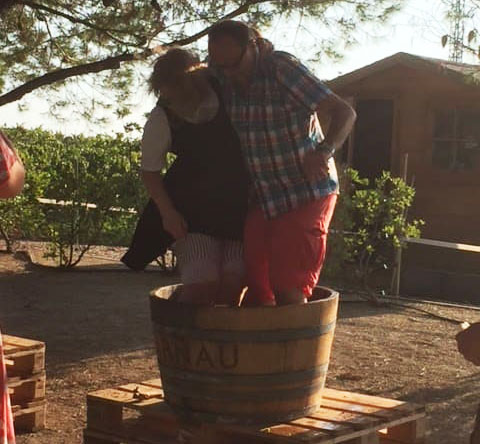 Sally crushing grapes in Spain