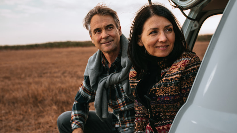 middle aged couple on a road trip