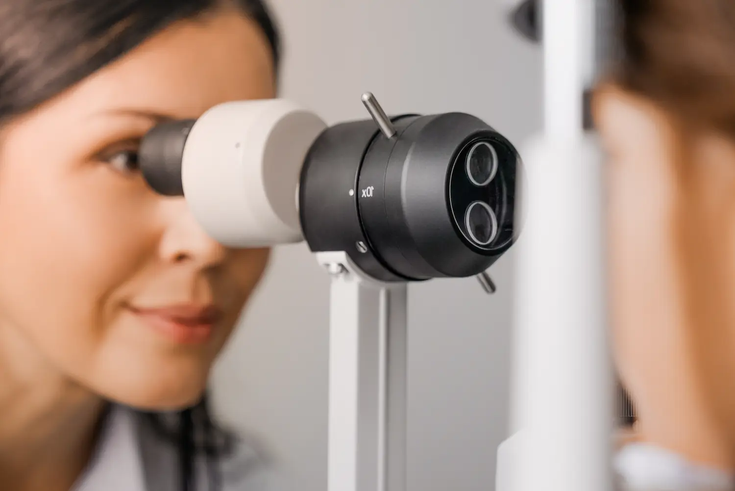 patient and doctor using eye machine
