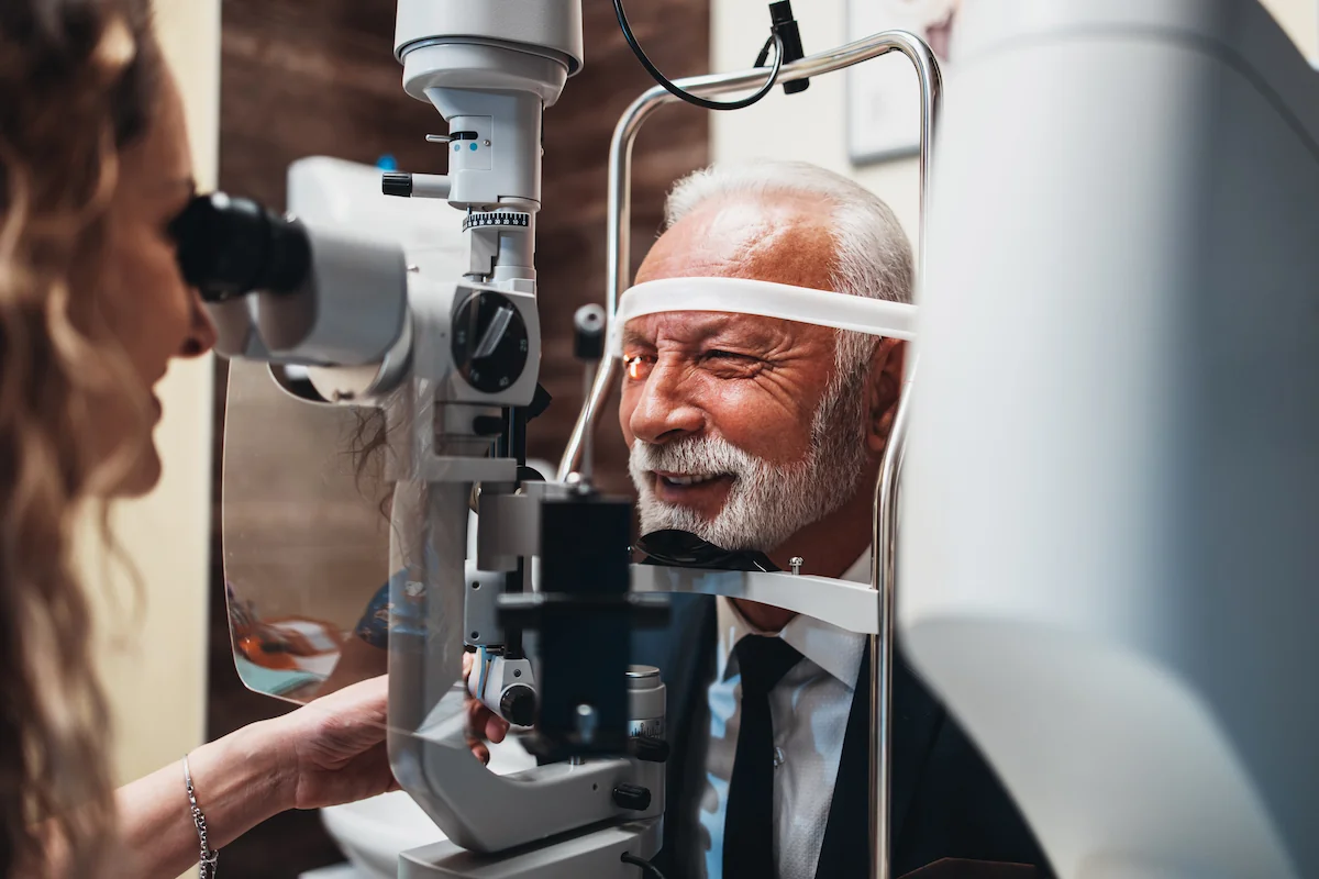Man having eyes examined before RLE surgery